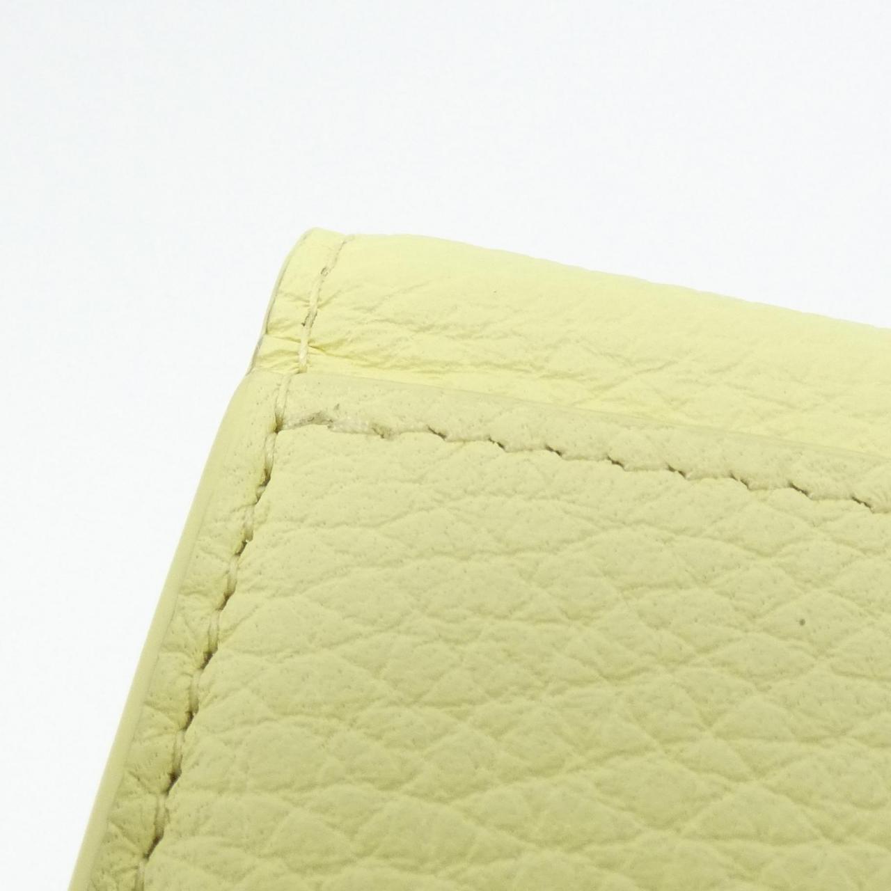 Louis Vuitton Portefeuille Capucines XS Taurillon Calf Wallet