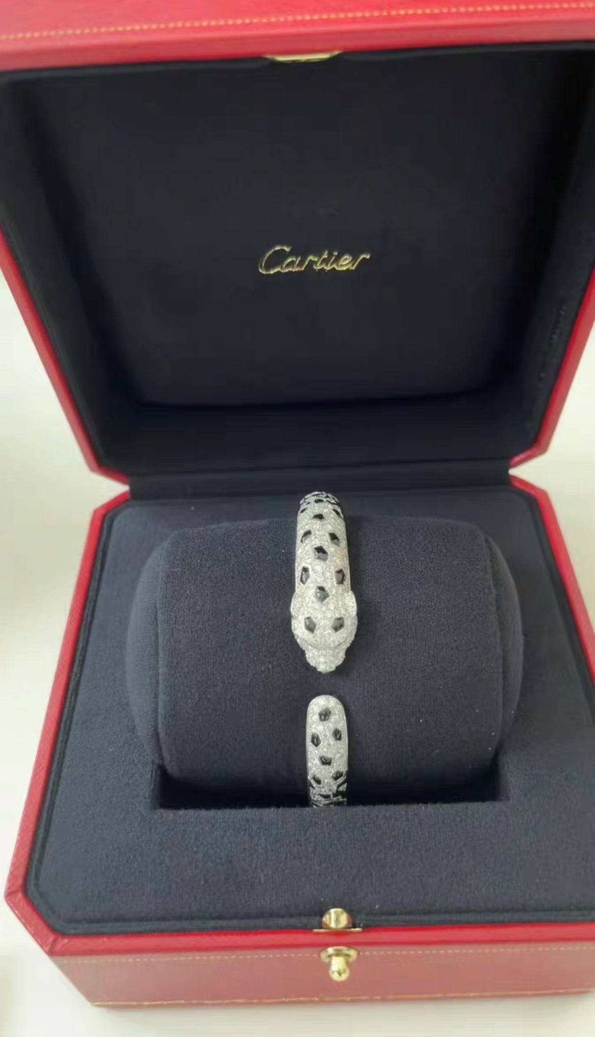 PANTHÈRE DE CARTIER BRACELET White gold, emeralds, onyx, diamonds size 18
