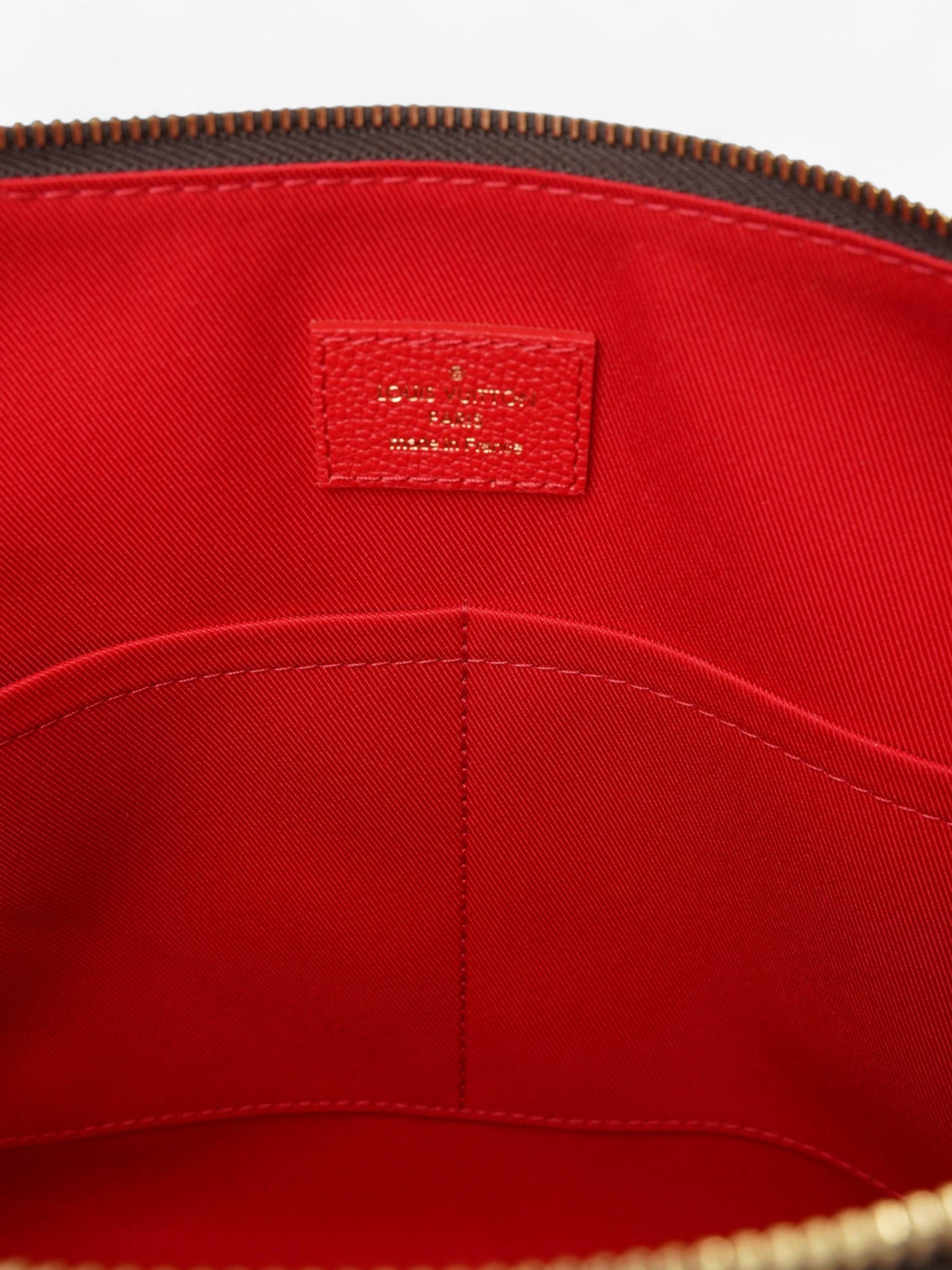 Louis Vuitton Tournelle PM Monogram / Red Coated Canvas