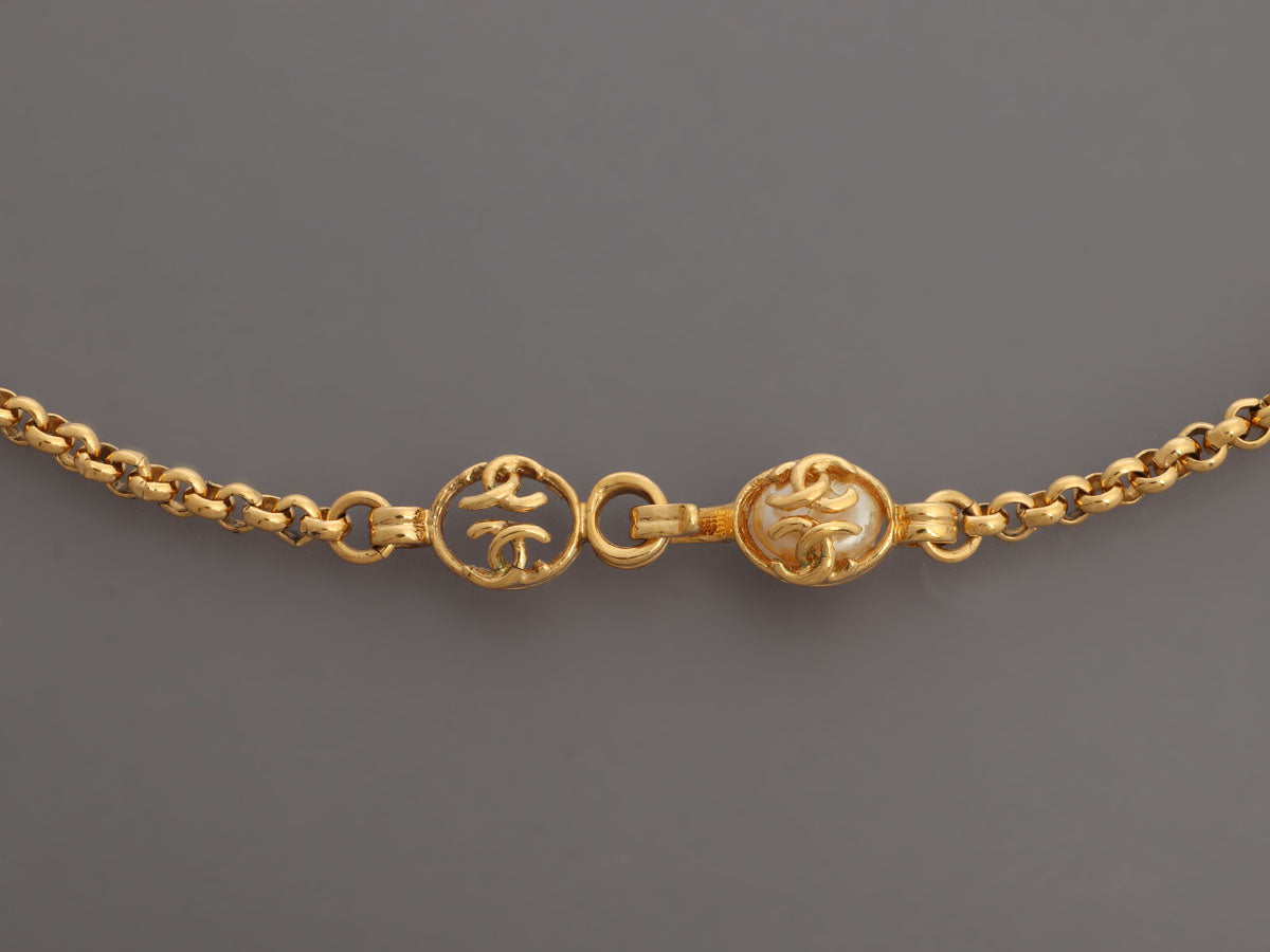 Chanel Vintage Long Pearl Logo Medallion Pendant Necklace