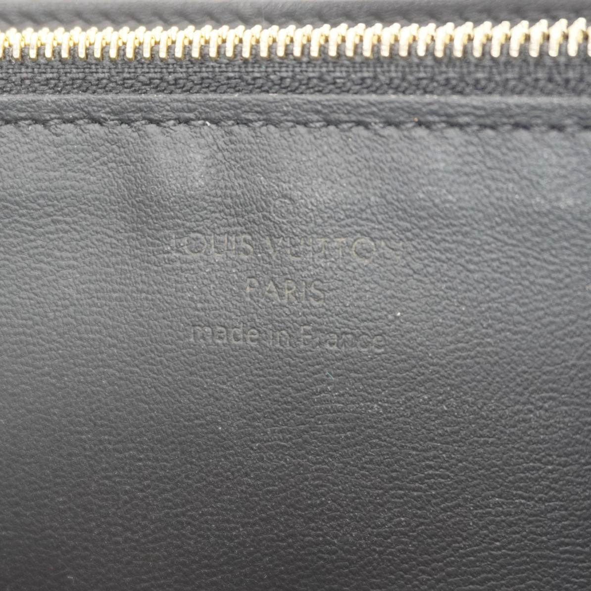 LOUIS VUITTON Capucines Crown Flowers Taurillon Leather Wallet Black