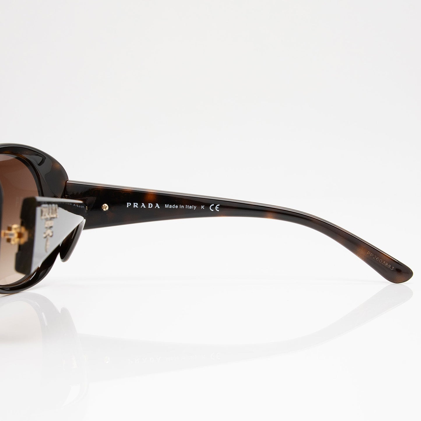 Prada Oval Sunglasses (SHF-47Cz0y)