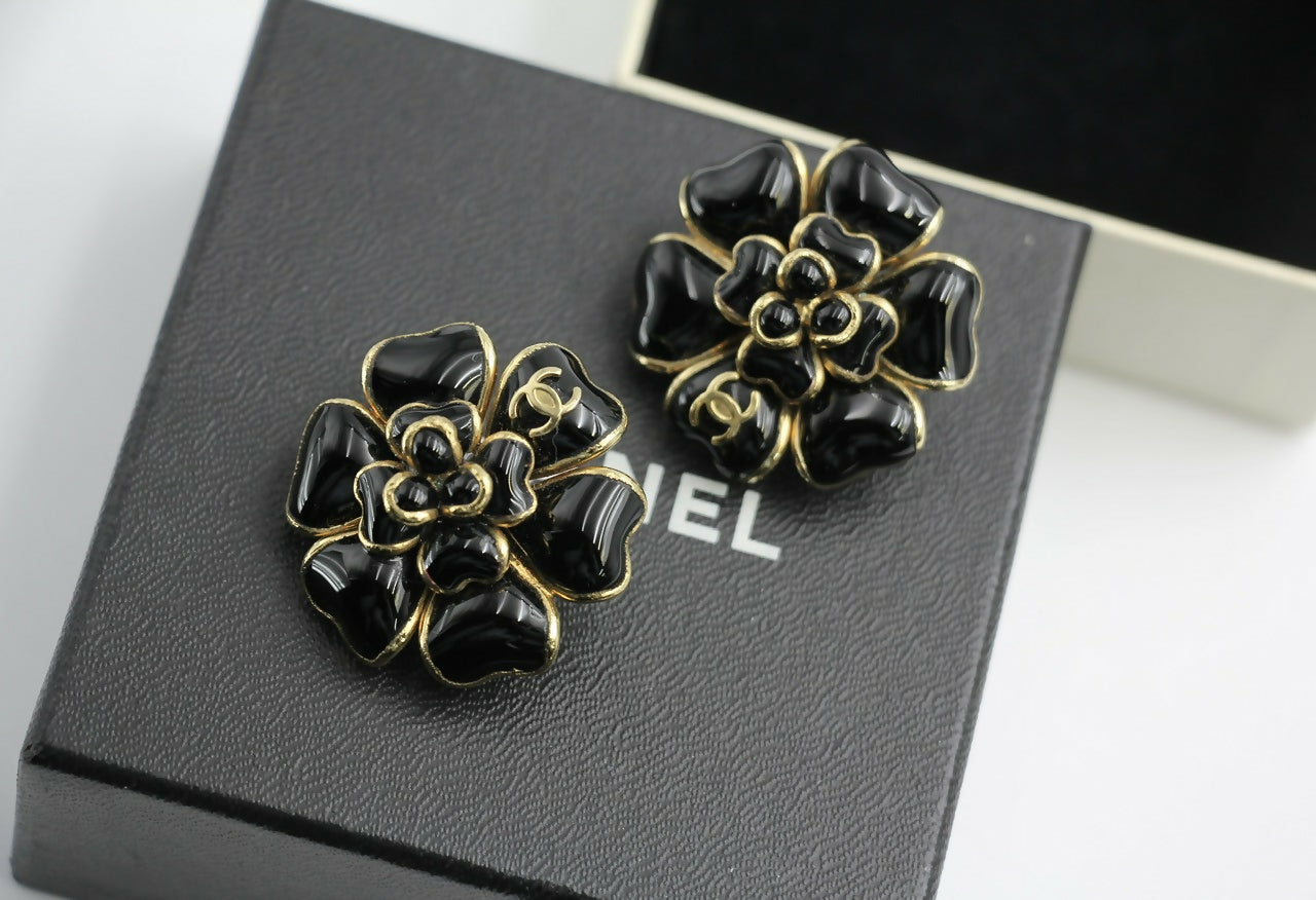 Chanel Vintage 02A Gripoix Shiny Black Large Camellia Clip-on Earrings