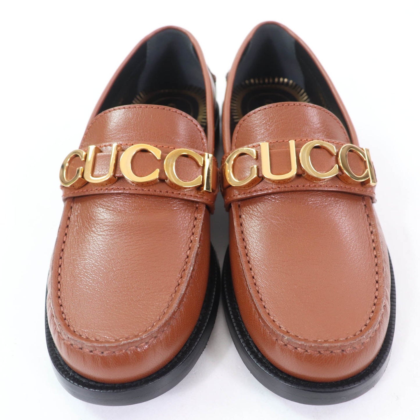 Gucci Logo Metal Leather Loafers