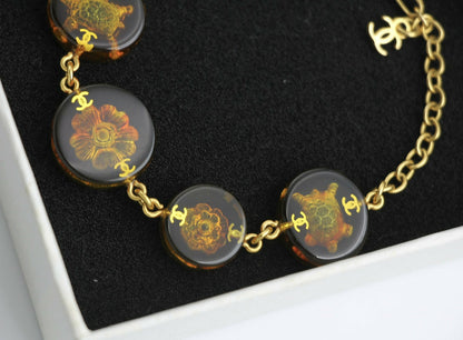 Chanel Vintage 98A Acrylic Dark Brown Turtle and Camellia Tortoise Shell Style Bracelet