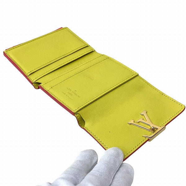 Louis Vuitton Portefeuille Capucines XS Taurillon Wallet