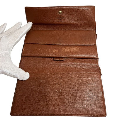 Louis Vuitton Porte Tresor International Monogram Wallet