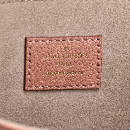 Louis Vuitton Pochette Metis Bicolor Monogram Empreinte Giant