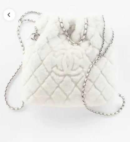 Chanel 22N white fur backpack