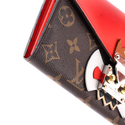 Louis Vuitton Tribal Mask Sarah Wallet Monogram Canvas and Leather