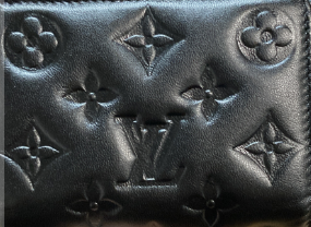 Louis Vuitton Coussin Lou Wallet Monogram Embossed Lambskin