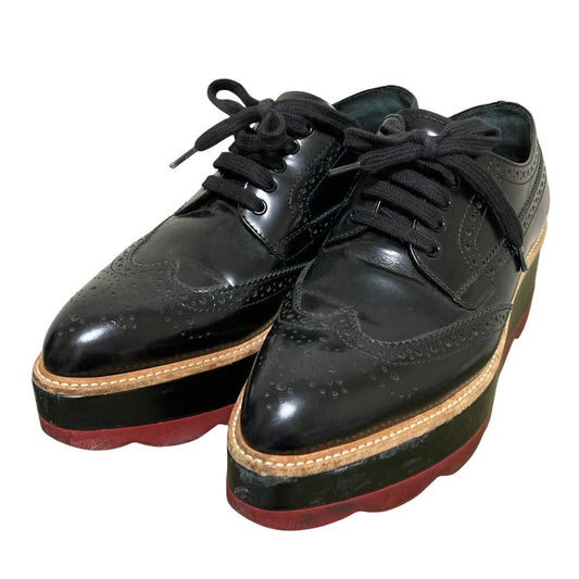 Prada Wave Sole Wingtip Shoes