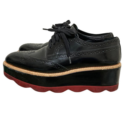 Prada Wave Sole Wingtip Shoes