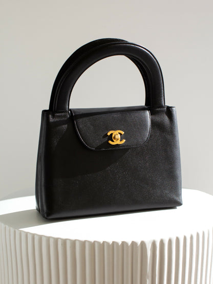 Chanel Vintage 1998 Kelly Black Caviar Leather 24K Gold Top Handle Bag