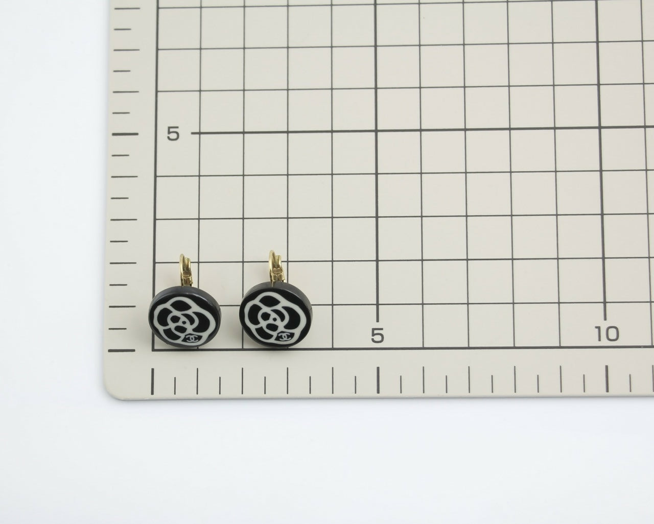 Chanel Vintage 03P Resin Black and White Camellia Button Hoop Earrings