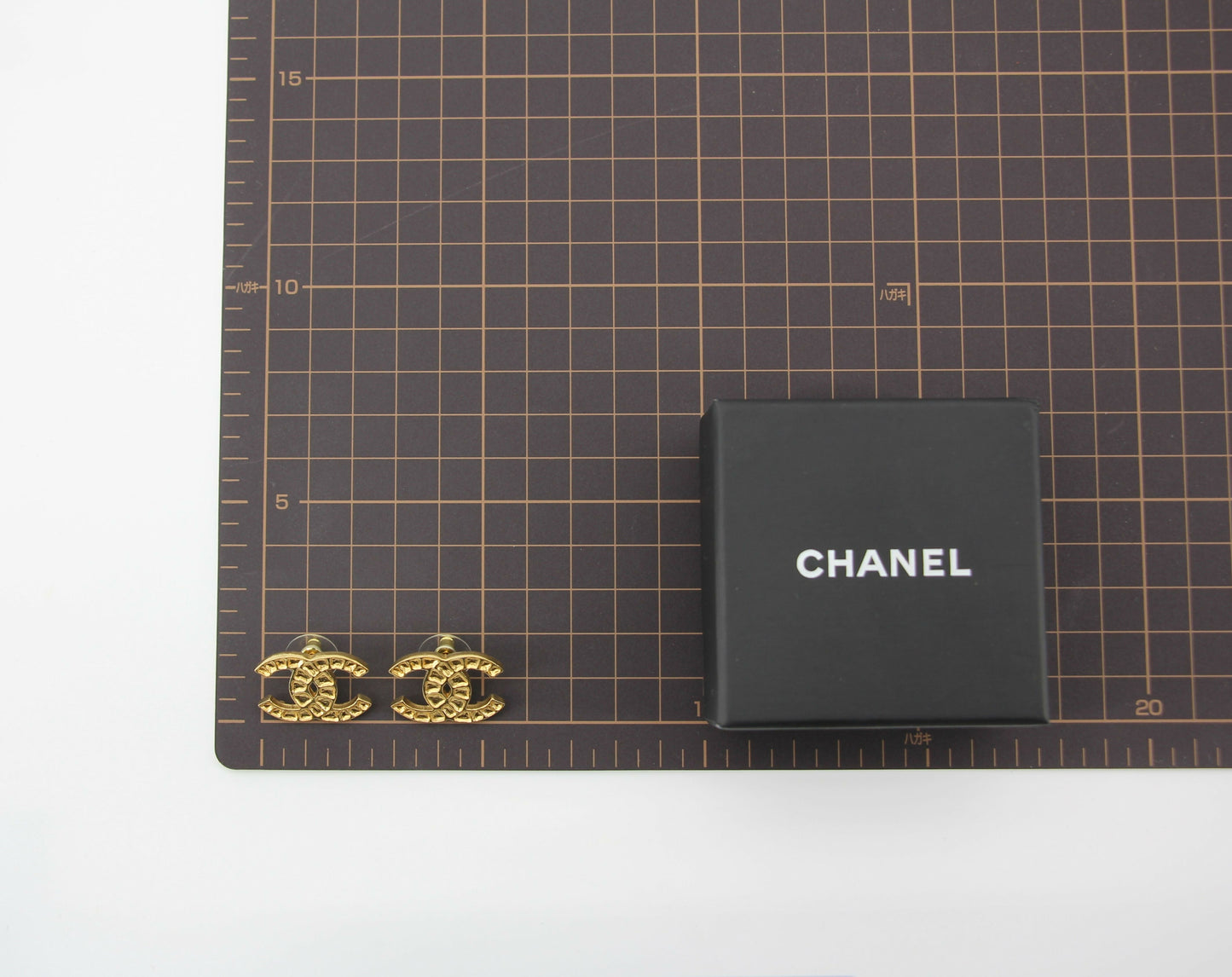 Chanel B19A Metal Square Embossed Gold CC Earrings