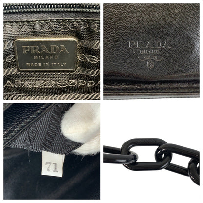 Prada Logo Embossed Leather Shoulder Bag