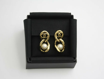 Chanel L20C Imitation Pearl Figure Eight Two-Buckle Lock Earrings
