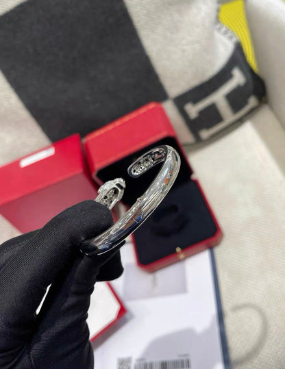 PANTHÈRE DE CARTIER BRACELET White gold, emeralds, onyx, diamonds size 16