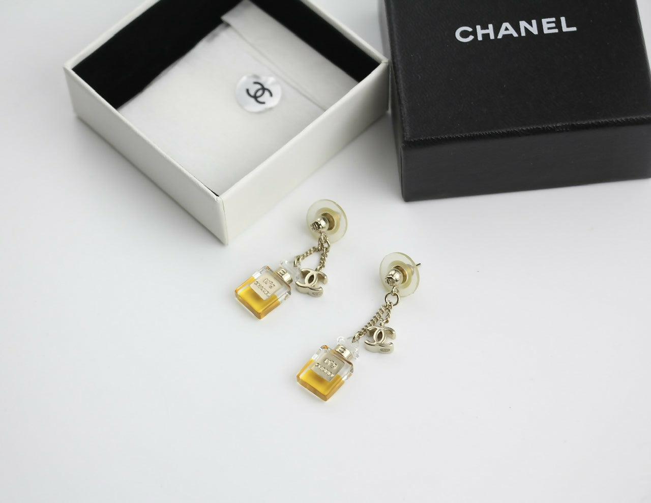 Chanel Vintage 08A Acrylic Perfume Bottle Stud Earrings