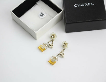 Chanel Vintage 08A Acrylic Perfume Bottle Stud Earrings