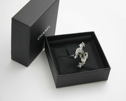 Chanel C21S Rhinestone Metal Silver Star Twist Brooch