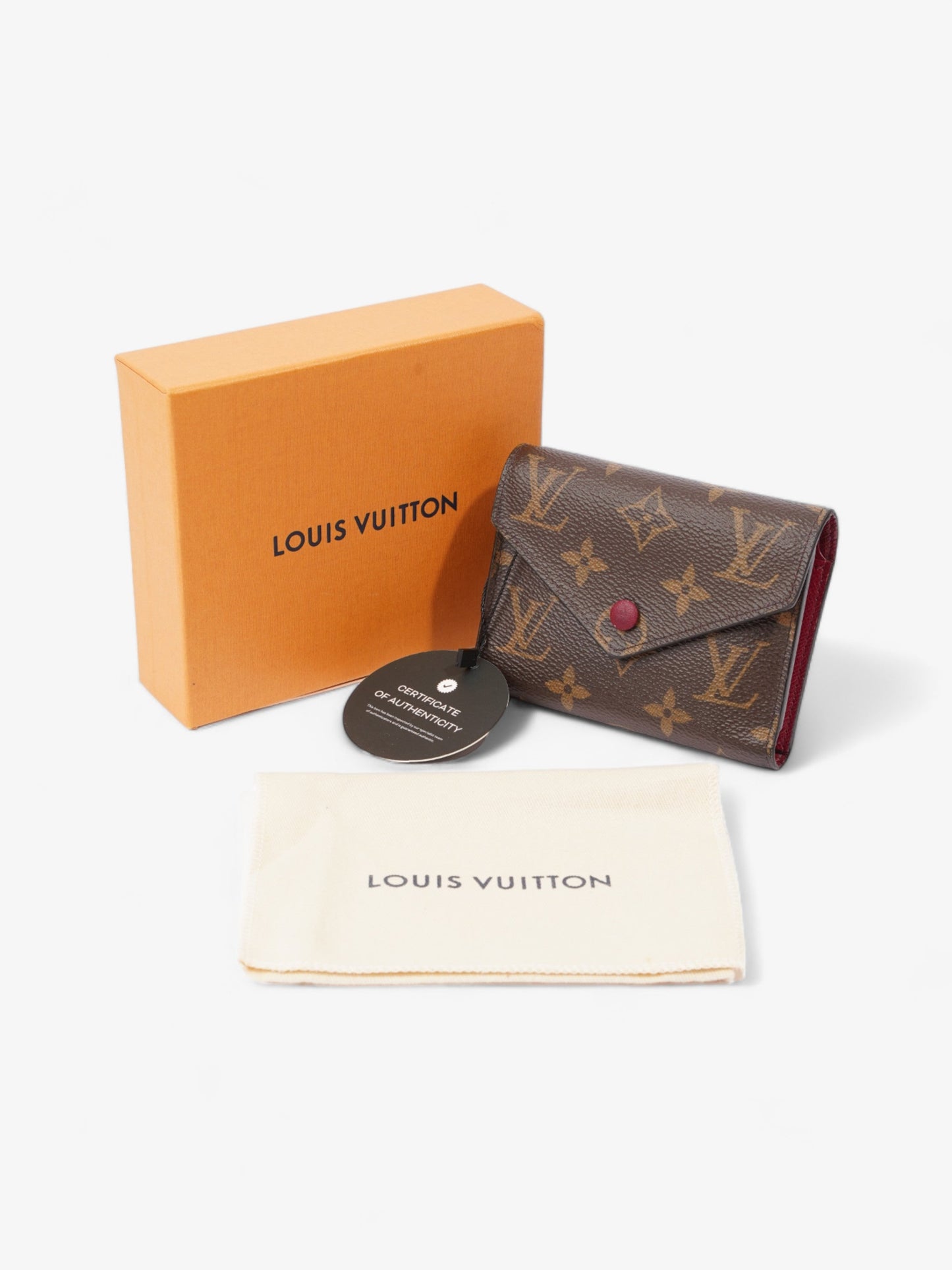 Louis Vuitton Victorine Monogram / Fuschia Canvas