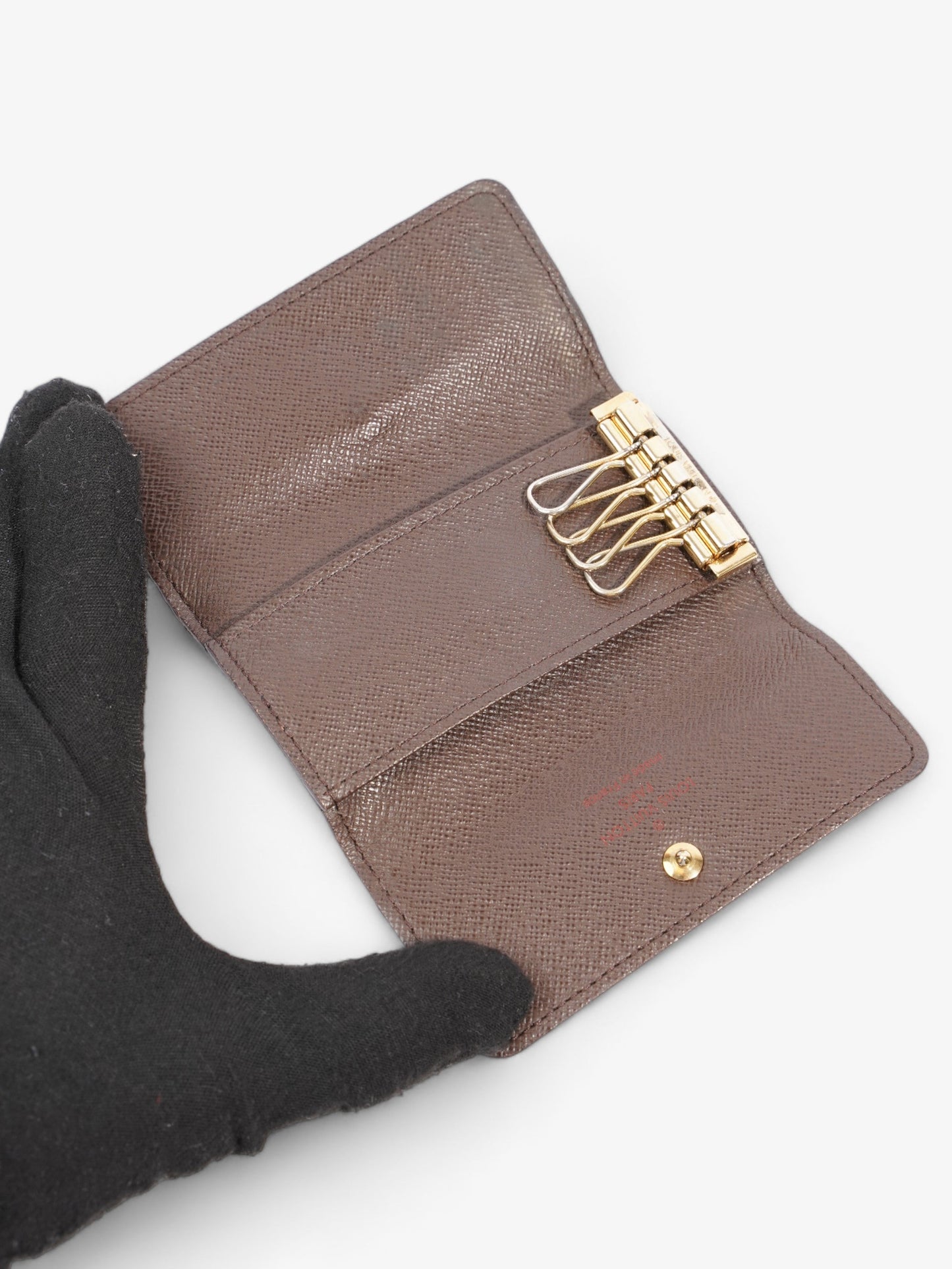 Louis Vuitton 4 Key Holder Damier Ebene Coated Canvas