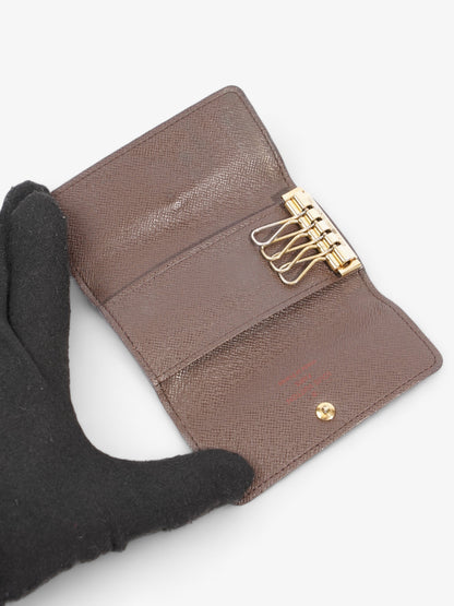 Louis Vuitton 4 Key Holder Damier Ebene Coated Canvas