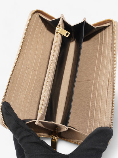 Saint Laurent Zip Round Wallet Beige Leather