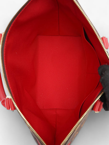 Louis Vuitton Tournelle PM Monogram / Red Coated Canvas