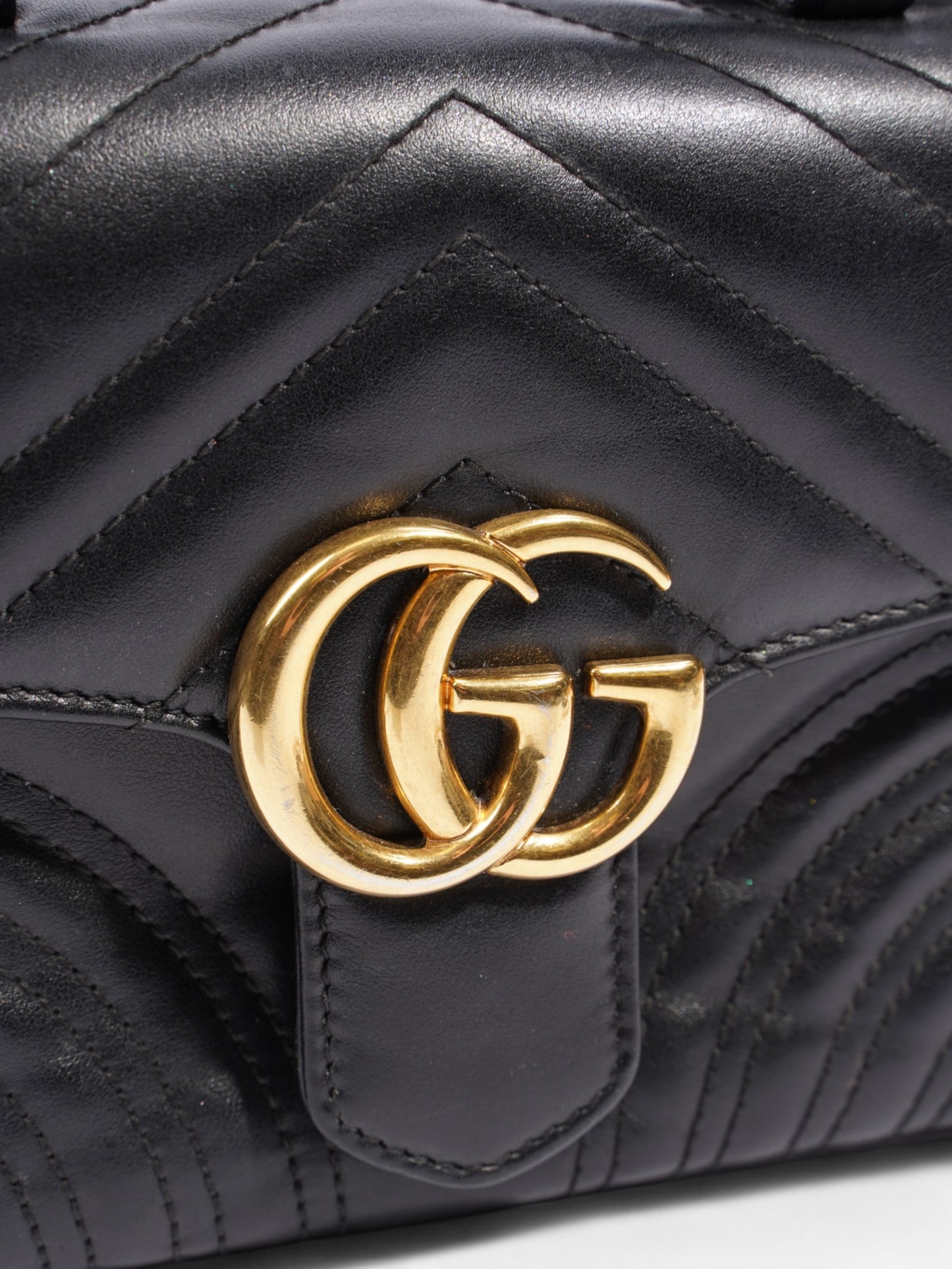 Gucci GG Marmont Mini Top Handle Bag in Quilted Black Leather Black GG Supreme Matelasse Leather Mini