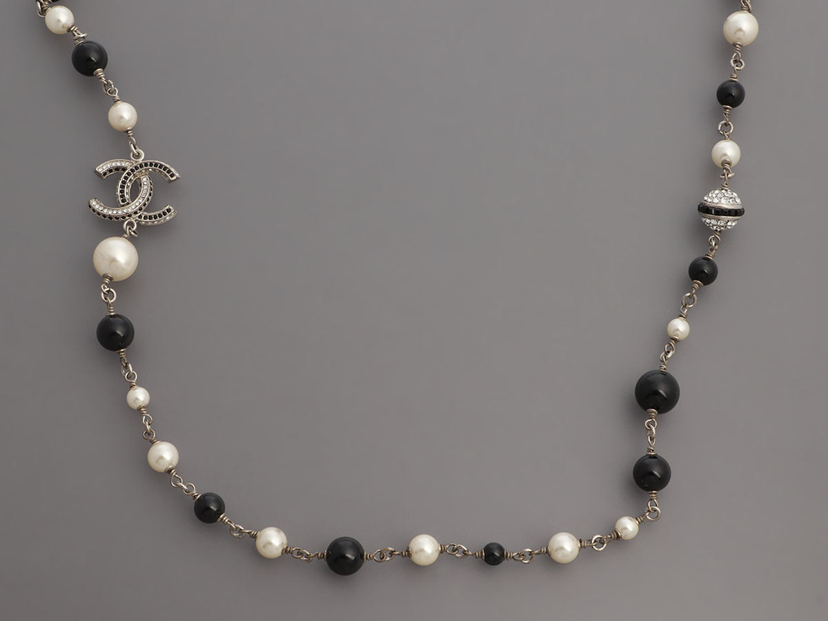 Chanel Long Black Beads, Pearls, and Crystal Logos Necklace