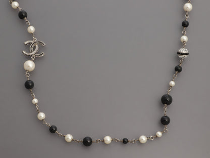 Chanel Long Black Beads, Pearls, and Crystal Logos Necklace