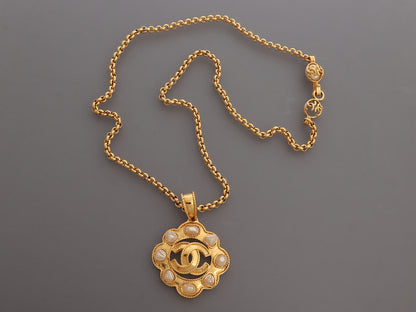 Chanel Vintage Long Pearl Logo Medallion Pendant Necklace