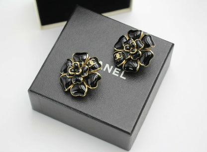 Chanel Vintage 02A Gripoix Shiny Black Large Camellia Clip-on Earrings