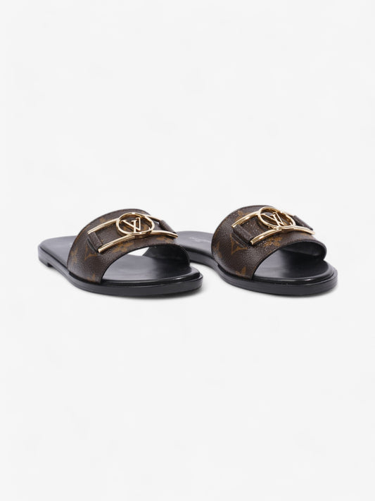 Louis Vuitton LV Lock It Flat Mules Monogram / Black Leather EU 37 UK 4