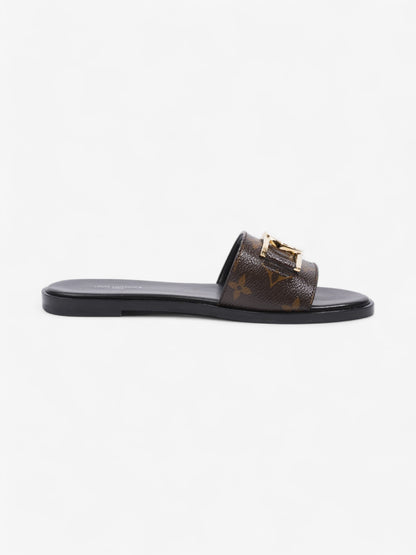 Louis Vuitton LV Lock It Flat Mules Monogram / Black Leather EU 37 UK 4
