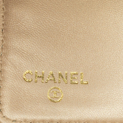 Chanel Camellia Embossed Lambskin Bifold Wallet (SHG-DrLXTc)