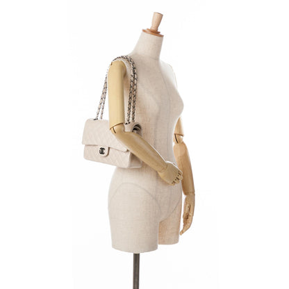 Chanel Medium Classic Lambskin Double Flap (SHG-ouJySv)