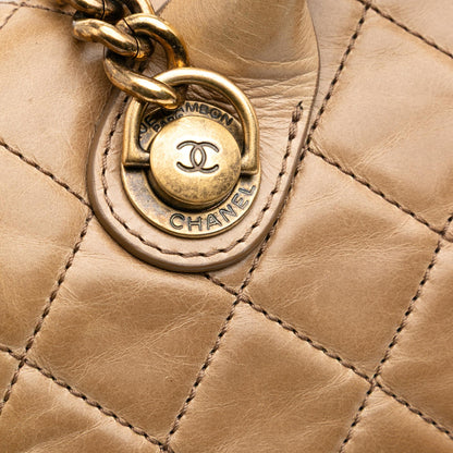 Chanel Medium Glazed Calfskin Castle Rock Top Handle Flap