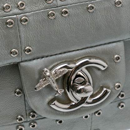 Chanel Medium Glazed Calfskin Grommet Embellished Airline Double Flap (SHG-3ngMjI)