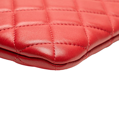 Chanel Medium Quilted Lambskin O Case Clutch