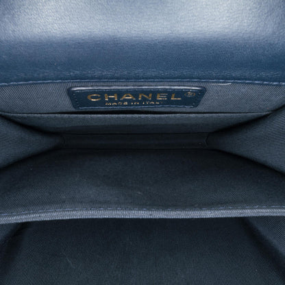 Chanel Metallic Lambskin Striped North South Boy Flap (SHG-gdf9Ua)