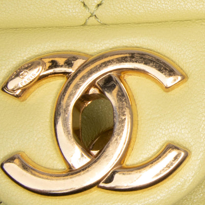 Chanel Mini Quilted Lambskin Oval Logo Chain Top Handle Flap