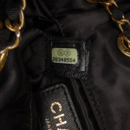 Chanel Quilted Nylon Crystal CC Drawstring Sling Bag