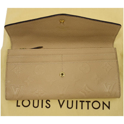 LOUIS VUITTON Curieuse Monogram Empreinte Leather Wallet Bronze