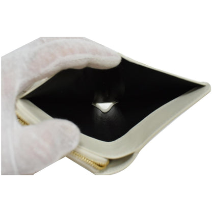 SAINT LAURENT Tiny Monogram Compact Leather Zip Around Wallet White