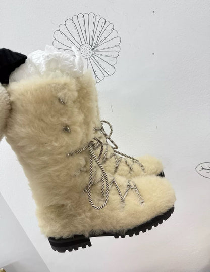 Chanel 24N ski coco neige beige fur boots