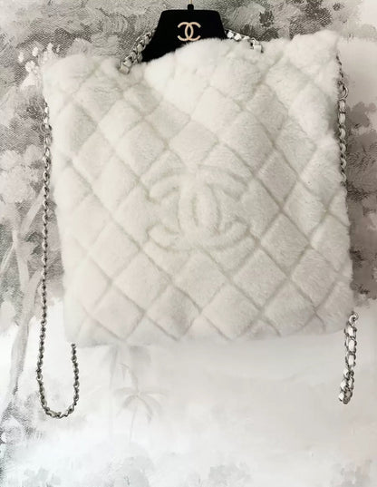 Chanel 22N white fur backpack